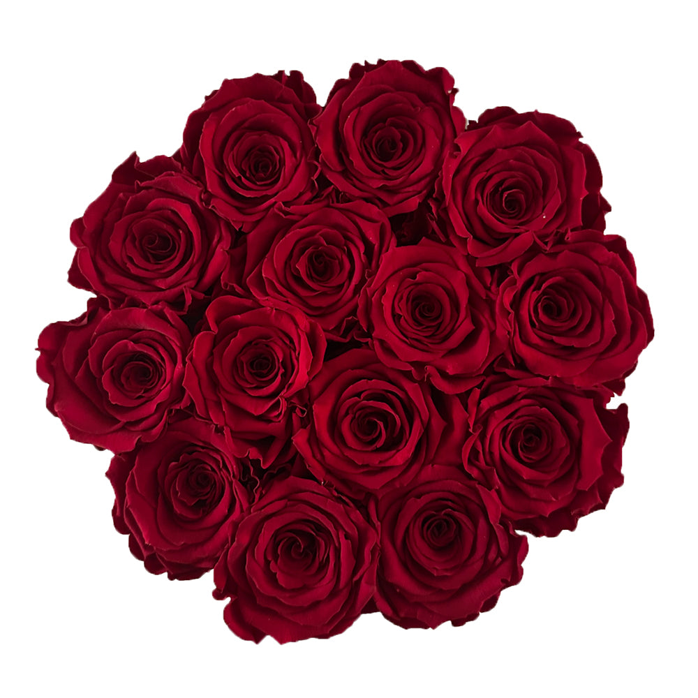 Bordowe wieczne róże w dużym okrągłym flower boxie